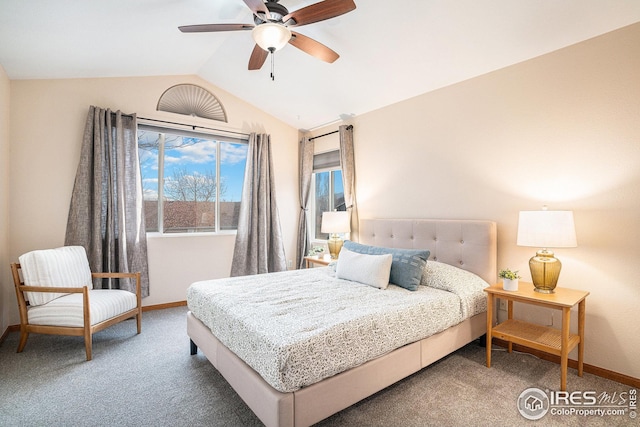 carpeted bedroom with baseboards, lofted ceiling, and ceiling fan