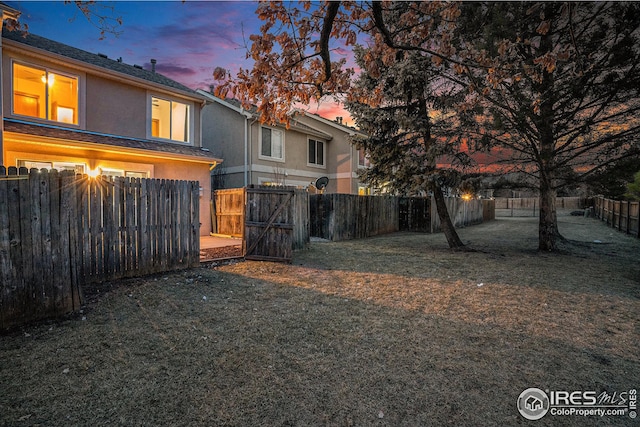 view of yard featuring a fenced backyard