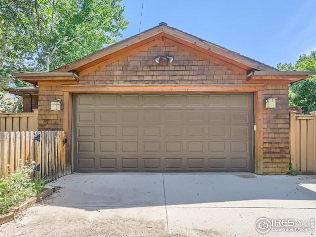 garage featuring fence