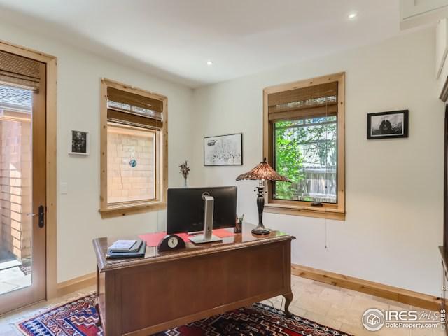 office with recessed lighting and baseboards