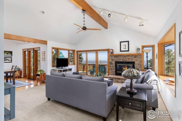 stairs featuring visible vents, baseboards, and a high ceiling