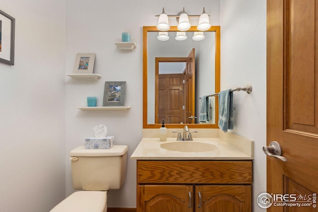 bathroom featuring double vanity, a garden tub, and a sink