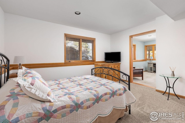 bedroom featuring recessed lighting, baseboards, and carpet floors