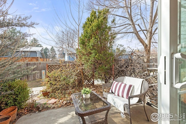 view of patio with fence