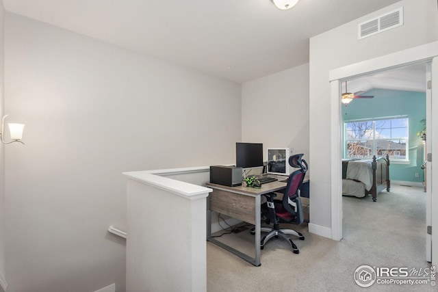 2556 Des Moines Dr Unit 103, Fort Collins, CO 80525 - office area with visible vents, baseboards, ceiling fan, vaulted ceiling, and light colored carpet