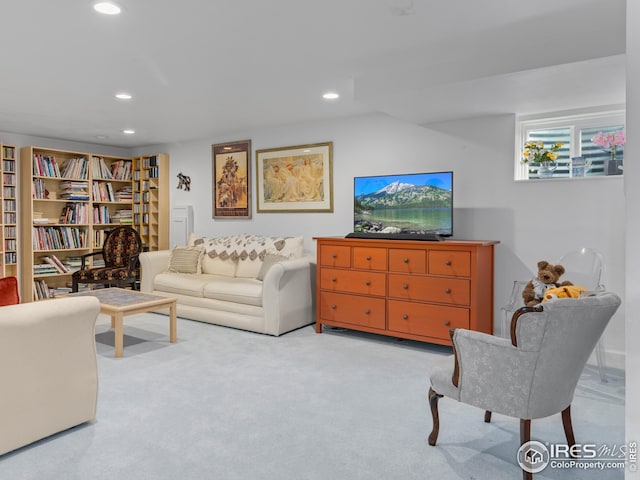 carpeted living room with recessed lighting