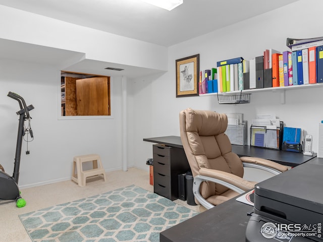 home office with baseboards and visible vents