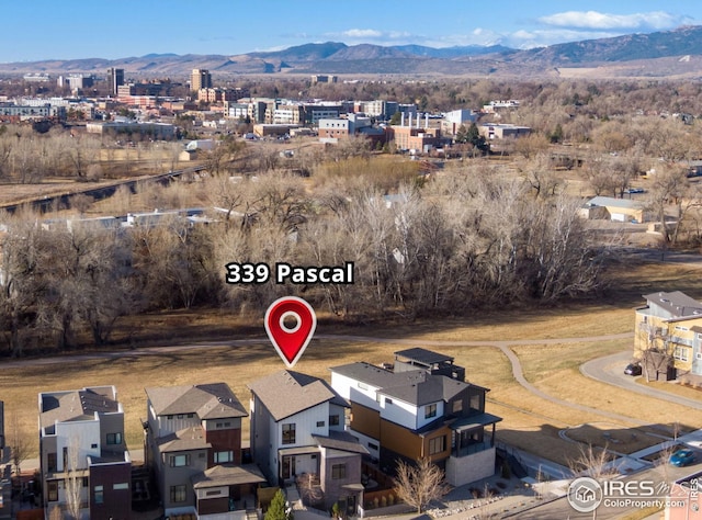 drone / aerial view featuring a mountain view