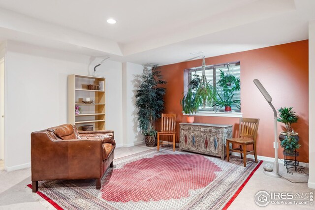 sitting room with recessed lighting and baseboards