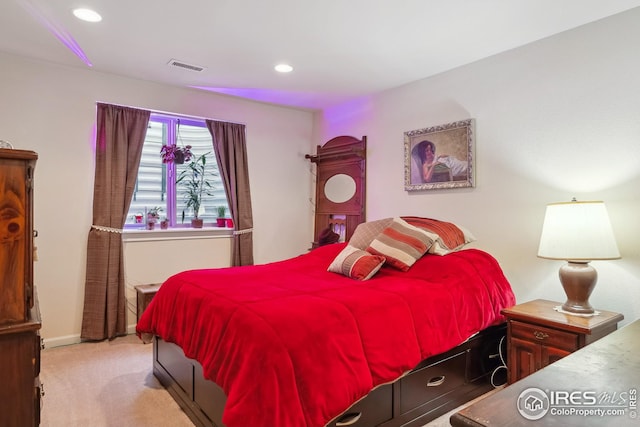 carpeted bedroom featuring visible vents, recessed lighting, and baseboards