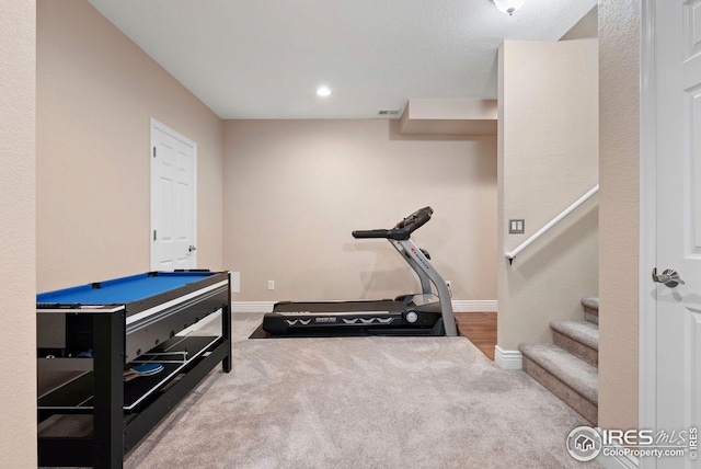 workout area featuring billiards, carpet flooring, and baseboards