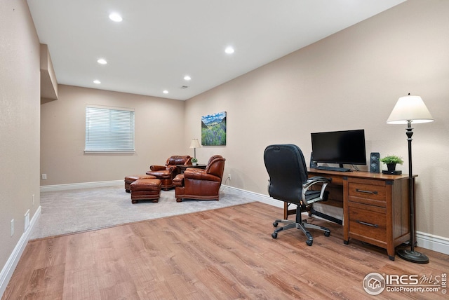 office with baseboards, light wood-type flooring, and recessed lighting