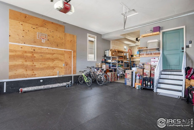 garage featuring a garage door opener
