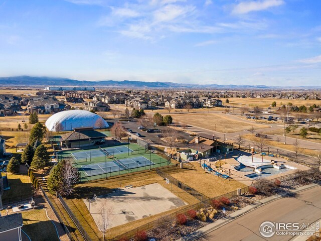 aerial view featuring a mountain view and a residential view