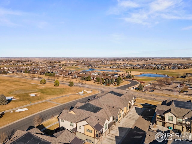 aerial view with view of golf course and a residential view