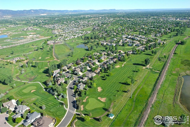 aerial view featuring a residential view and a water and mountain view
