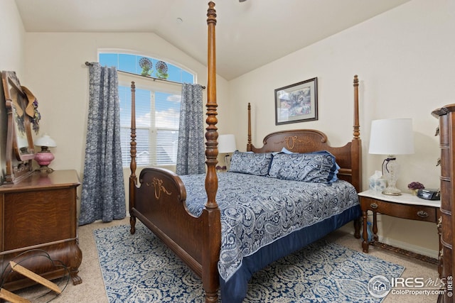 bedroom featuring lofted ceiling