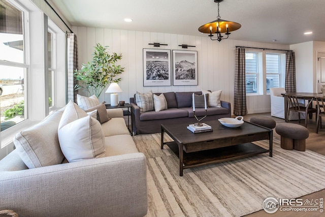 living area with recessed lighting and light wood-type flooring