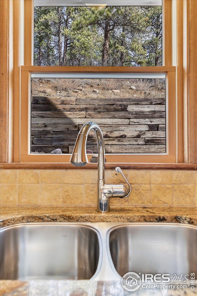 interior details featuring a sink