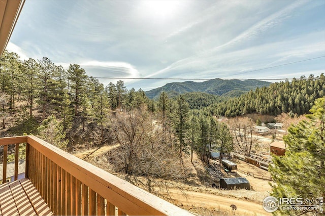 property view of mountains with a wooded view