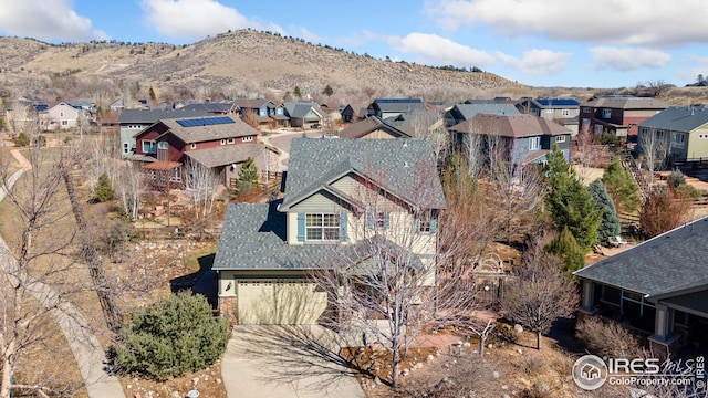 bird's eye view featuring a mountain view and a residential view