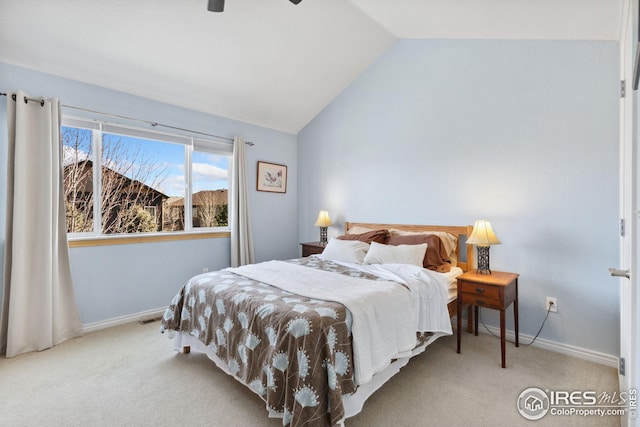 carpeted bedroom featuring visible vents, baseboards, a ceiling fan, and vaulted ceiling