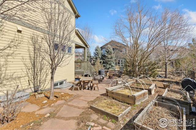 view of patio with a vegetable garden