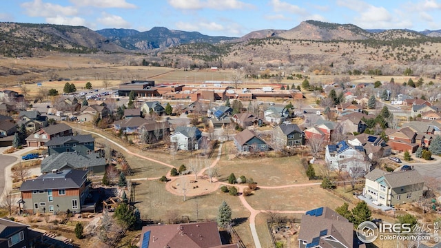 drone / aerial view featuring a mountain view and a residential view