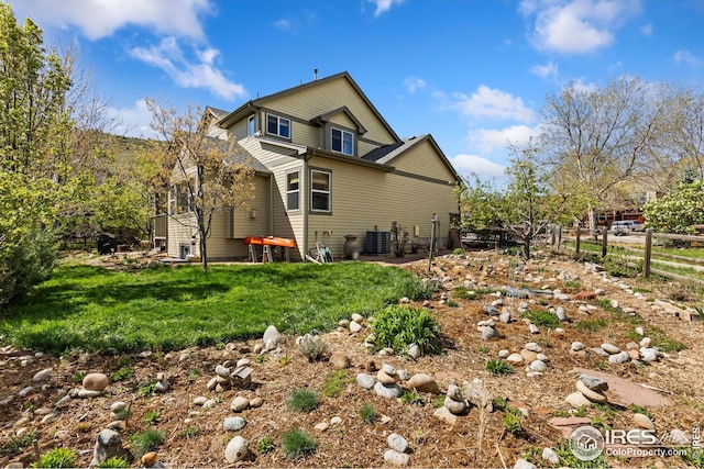 107 Bohn Ct, Lyons, CO 80540 - rear view of property featuring central AC unit