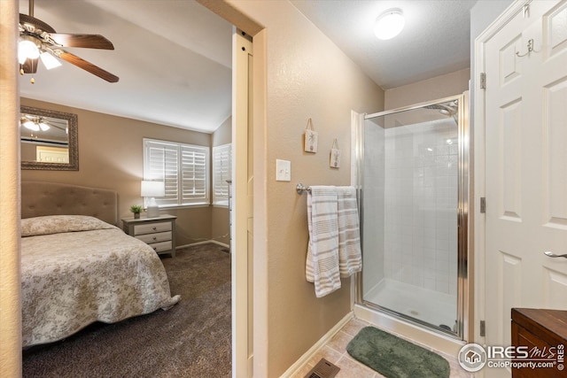 ensuite bathroom featuring a ceiling fan, visible vents, baseboards, ensuite bath, and a stall shower