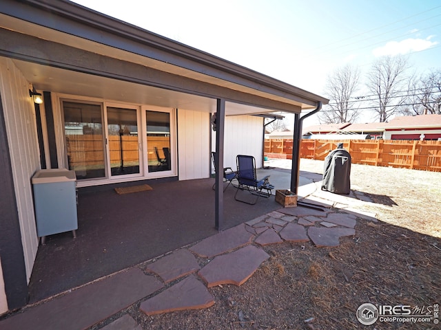 view of patio / terrace with fence