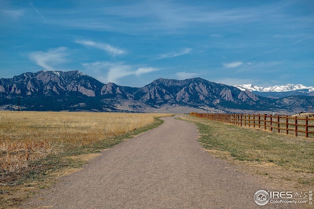 mountain view featuring a rural view