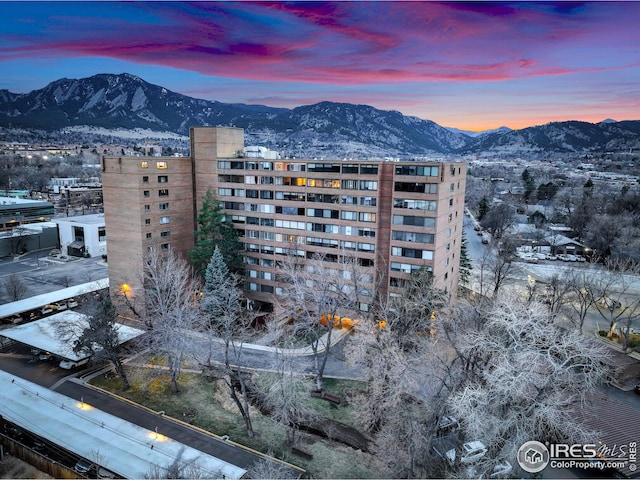 view of building exterior with a mountain view