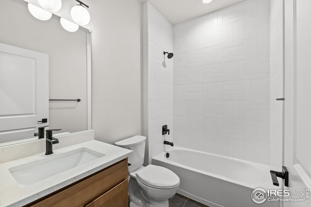 full bathroom featuring toilet, vanity, and shower / bathing tub combination