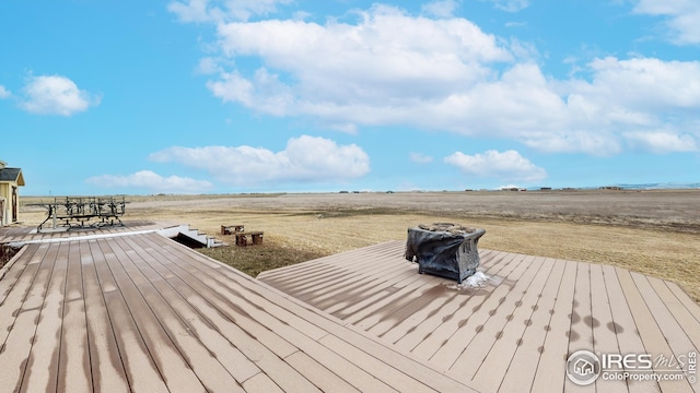 deck featuring outdoor dining area