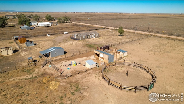 aerial view featuring a rural view and view of desert