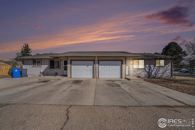 1257 E 6th St, Loveland, CO 80537 - single story home with an attached garage and driveway