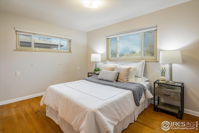 169 Emerald St, Broomfield, CO 80020 - bedroom with baseboards and light wood-type flooring