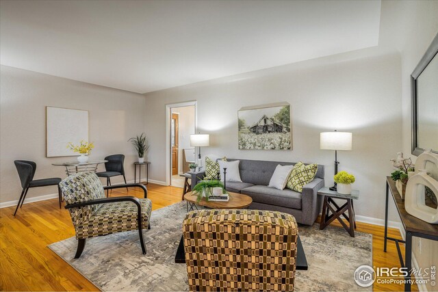 169 Emerald St, Broomfield, CO 80020 - living room featuring baseboards and light wood-style flooring