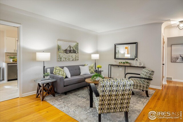 169 Emerald St, Broomfield, CO 80020 - living room with light wood-style floors, visible vents, and baseboards