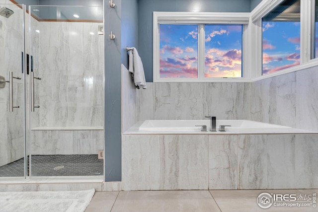 8568 Foxhaven Ct, Niwot, CO 80503 - bathroom featuring a marble finish shower and a bath