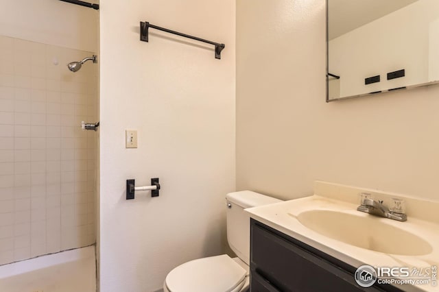 5126 Williams Fork Trl Unit 206, Boulder, CO 80301 - bathroom with vanity, toilet, and tiled shower