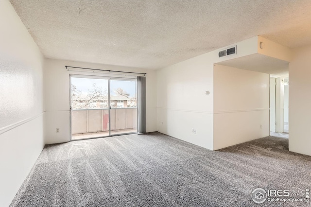 5126 Williams Fork Trl Unit 206, Boulder, CO 80301 - spare room with carpet floors, a textured ceiling, and visible vents