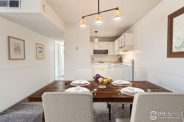 5126 Williams Fork Trl Unit 206, Boulder, CO 80301 - dining room featuring visible vents and a textured ceiling