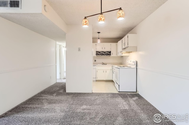5126 Williams Fork Trl Unit 206, Boulder, CO 80301 - kitchen featuring a textured ceiling, visible vents, light carpet, under cabinet range hood, and white range with electric cooktop