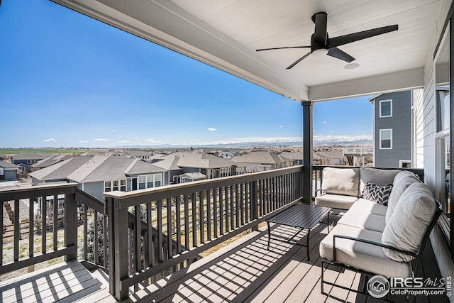 exterior space featuring a residential view and a ceiling fan
