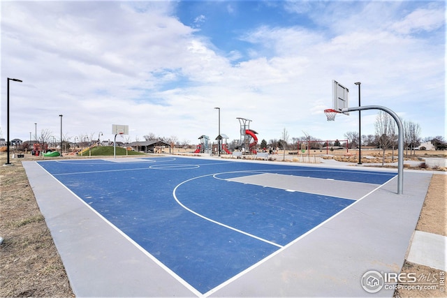 view of basketball court with community basketball court and playground community