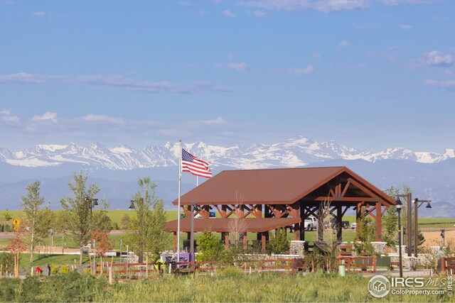 surrounding community featuring a gazebo and a mountain view