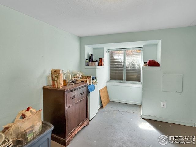 105 N Logan Ave, Haxtun, CO 80731 - interior space with concrete flooring