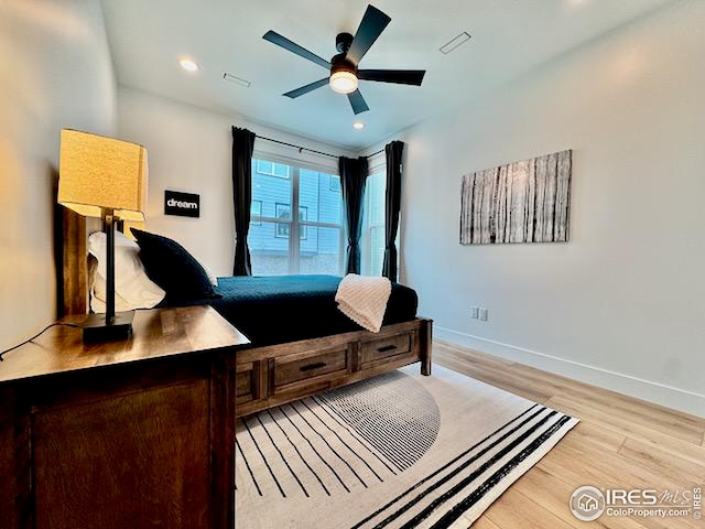 bedroom with baseboards, ceiling fan, recessed lighting, and light wood finished floors